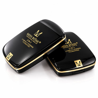 Two black cosmetic cases with gold accents on a white background